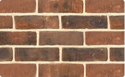Weathered black textured brick